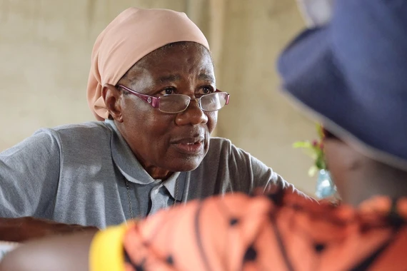 Sister Martine, a trained nurse, dispensing medicine at the Catholic mission’s health center in Ntui, Cameroon.