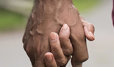 Couple holding hands