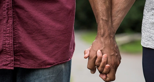 A couple holding hands