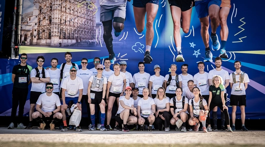 Group of runners posing for a photoshoot